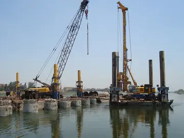 Bauer Egypt executed complex offshore piling for the Aswan Nile Bridge, securing the foundation to ensure structural stability across the Nile