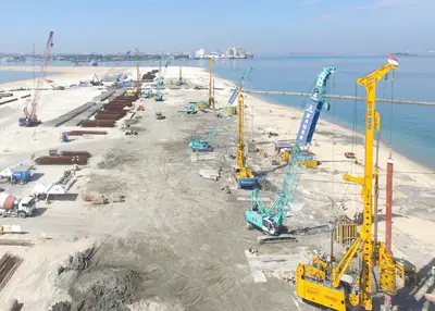 Drilling rigs on construction site of Makassar New Port Project in Indonesia by Bauer Spezialtiefbau